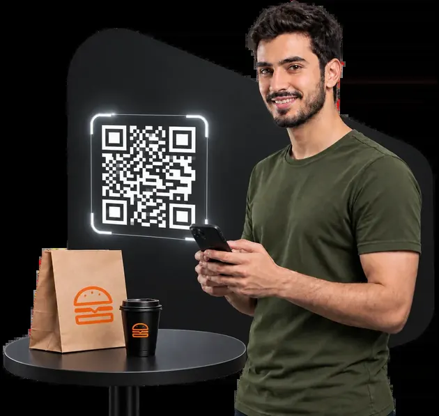 زبون يمسح كود QR بهاتفه لفتح المنيو الإلكتروني للمطعم
